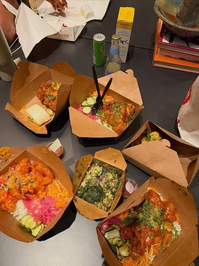 A candlelit dinner table set for four